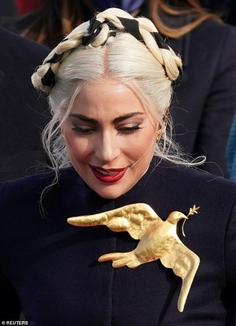 Lady Gaga and her gold dove.