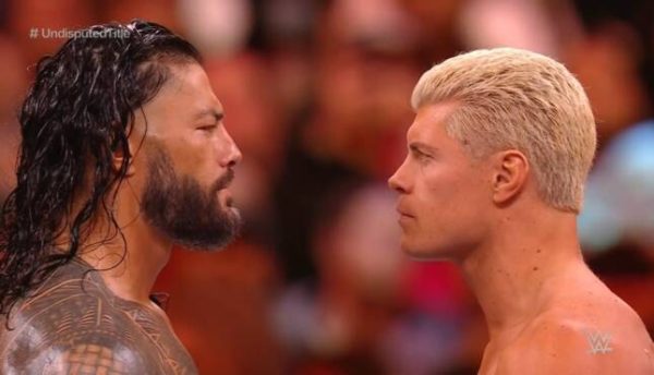 Roman Reigns (L) vs Cody Rhodes (R)